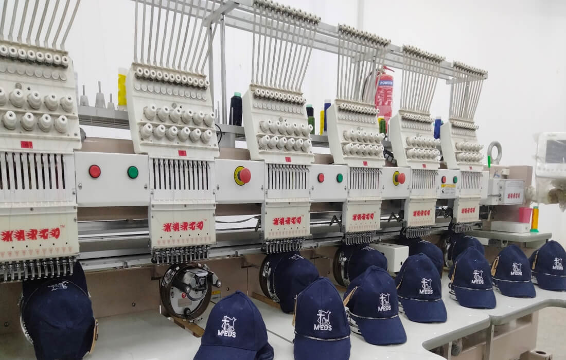 Embroidery machine doing embroidery on caps in Nairobi